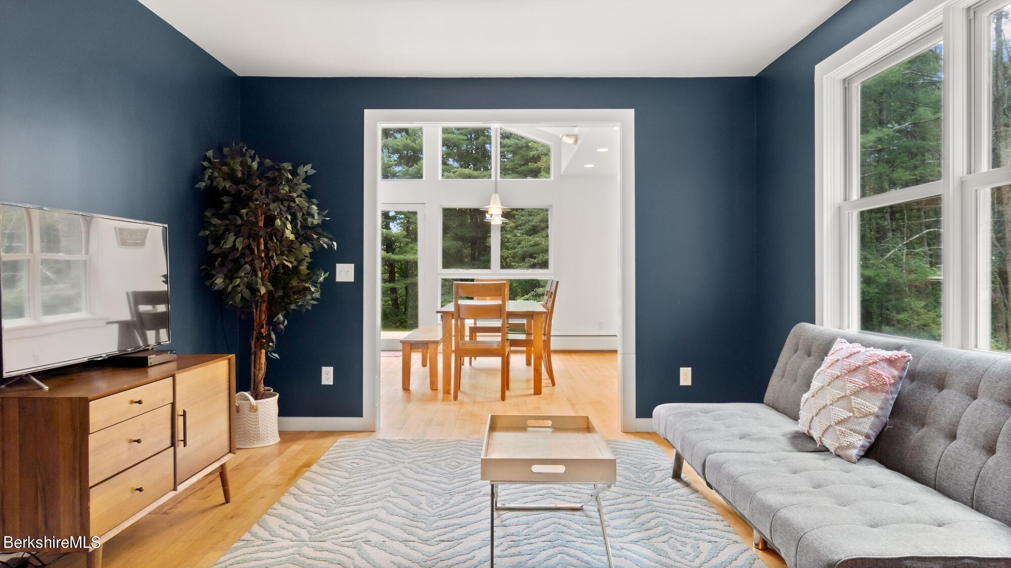 16 Squaw Peak Road Great Barrington, MA 01230 - Photo 12 of 38 a living room with furniture and a window