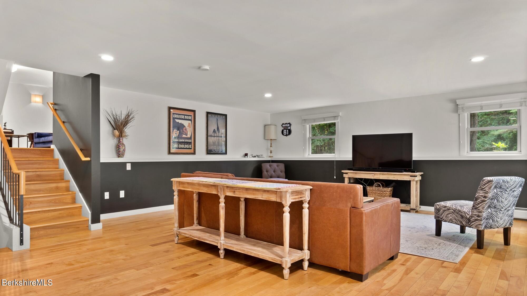 16 Squaw Peak Road Great Barrington, MA 01230 - Photo 16 of 38 a living room with furniture and a flat screen tv