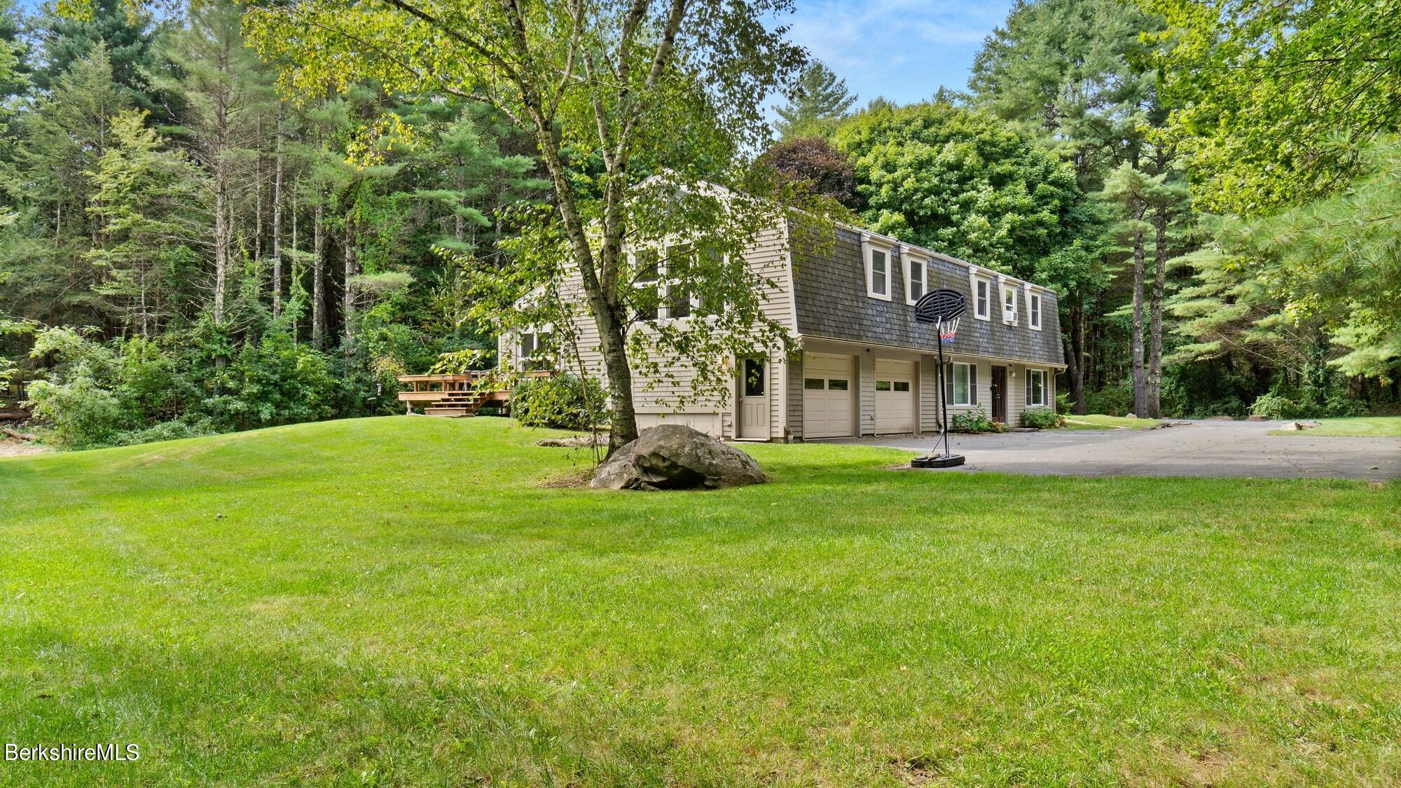 16 Squaw Peak Road Great Barrington, MA 01230 - Photo 3 of 38 a house view with a garden space