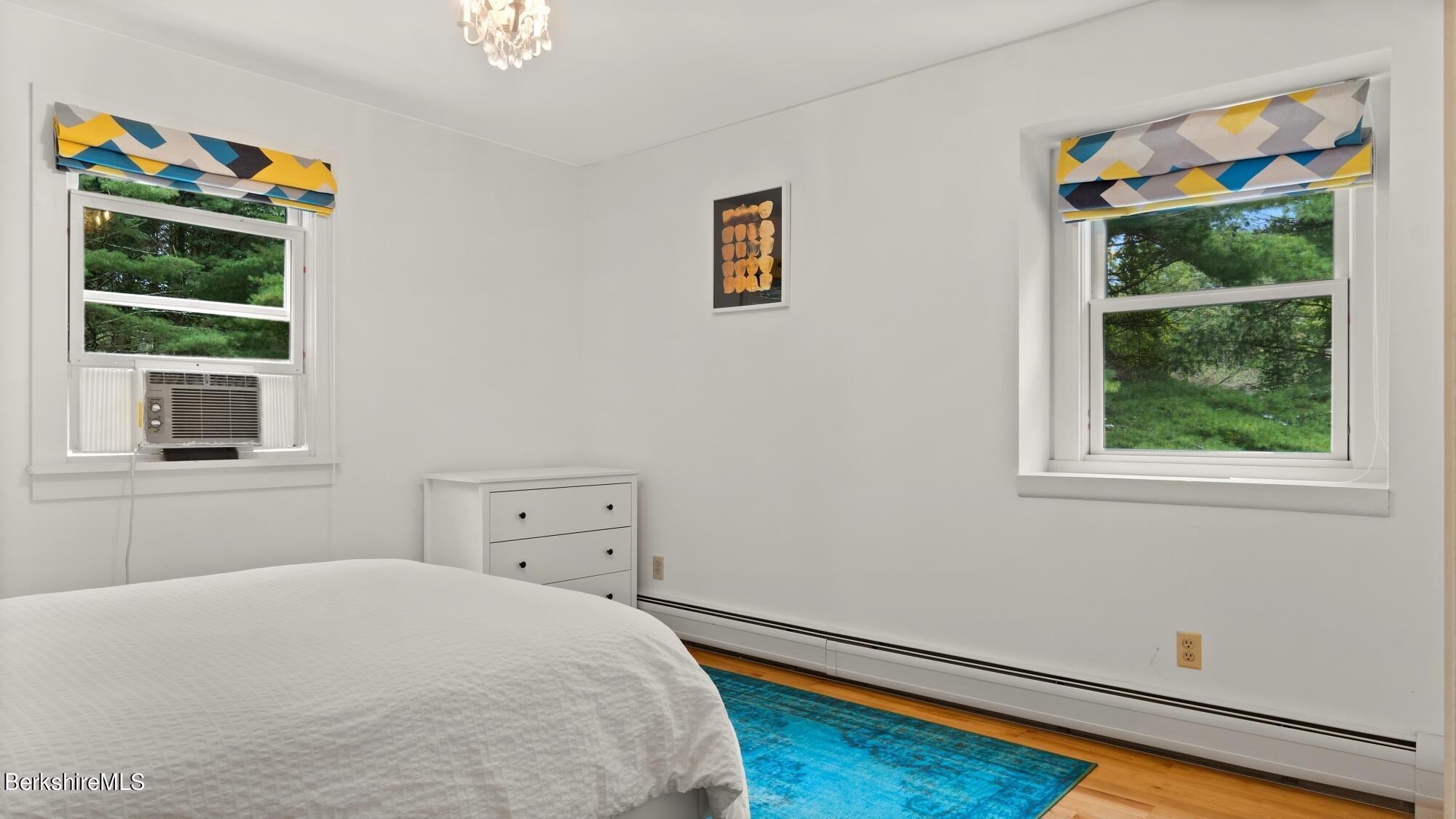 16 Squaw Peak Road Great Barrington, MA 01230 - Photo 28 of 38 a bedroom with a bed and a window