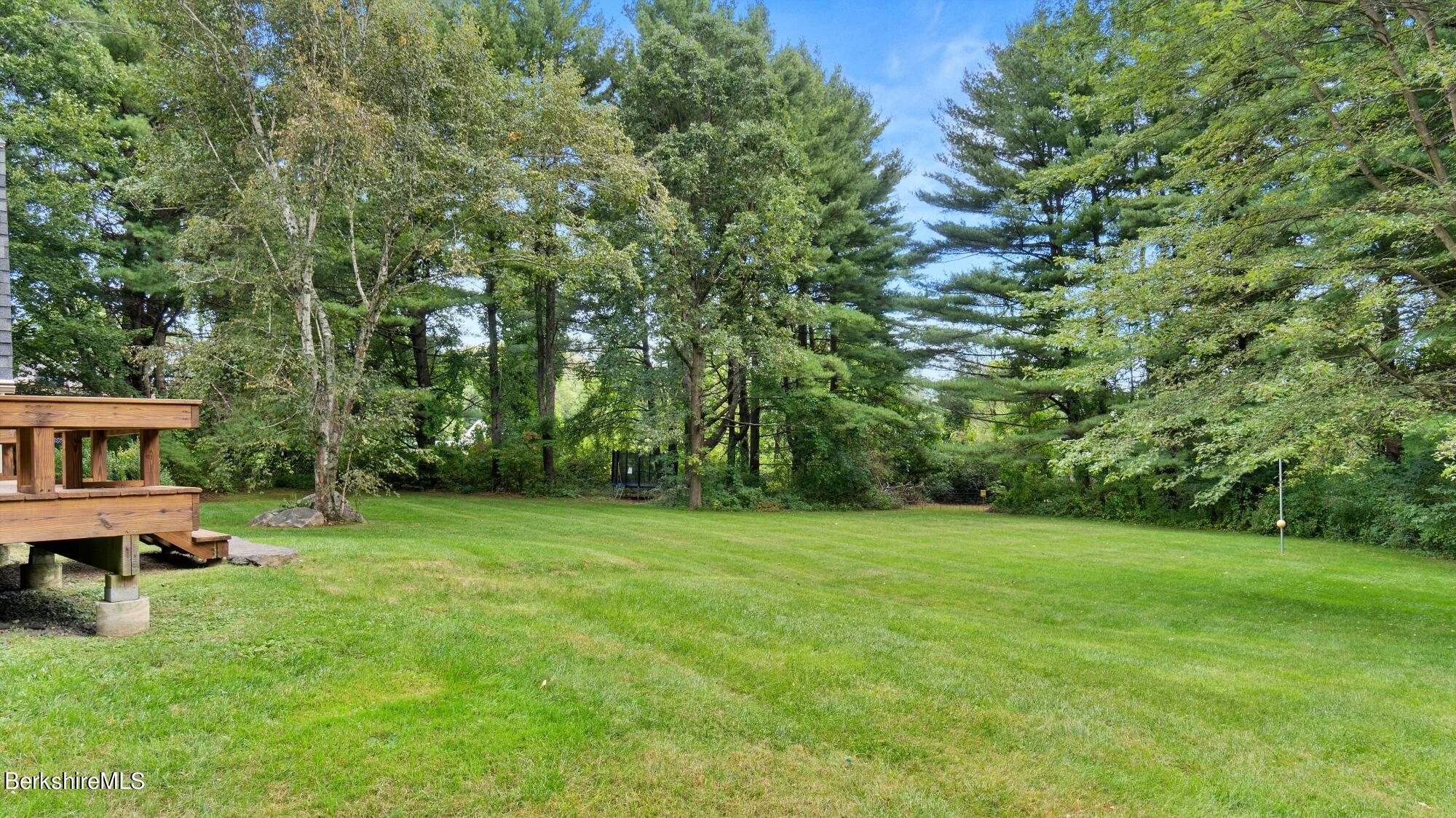 16 Squaw Peak Road Great Barrington, MA 01230 - Photo 34 of 38 a view of a grassy field with trees
