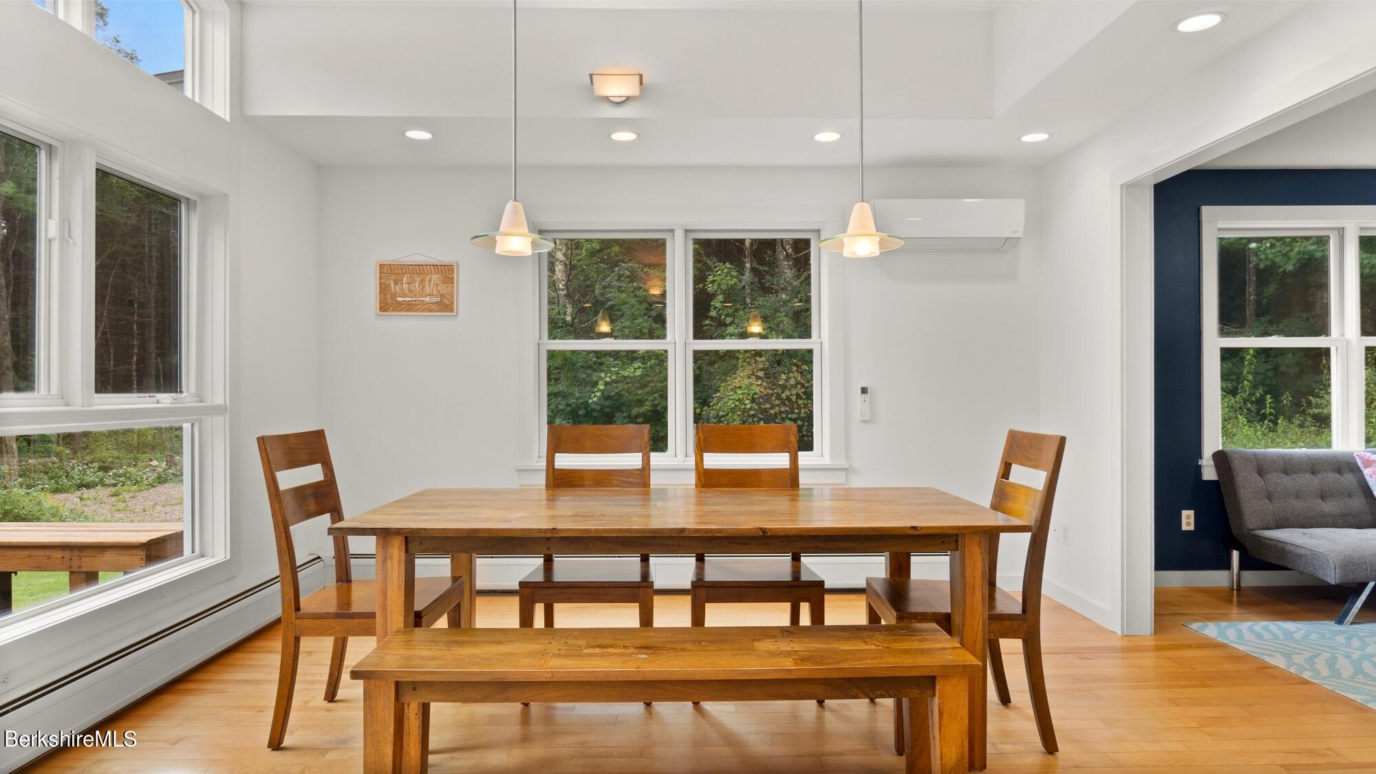 16 Squaw Peak Road Great Barrington, MA 01230 - Photo 8 of 38 a view of a dining room with furniture window and outside view