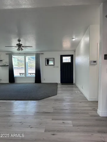 a view of an empty room and window