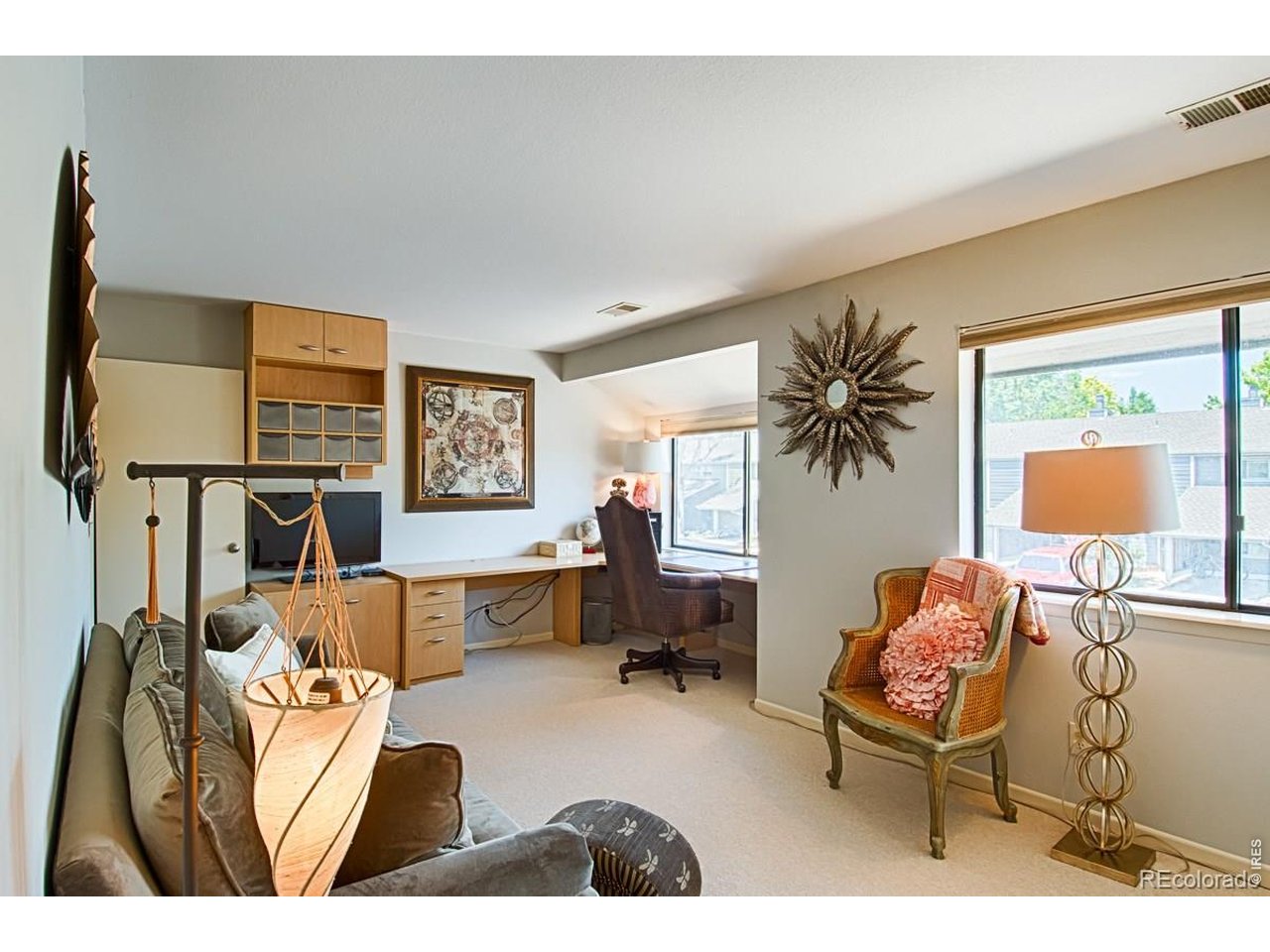 2948 Eagle Way Boulder, CO 80301 - Photo 26 of 29 a living room with furniture and a lamp