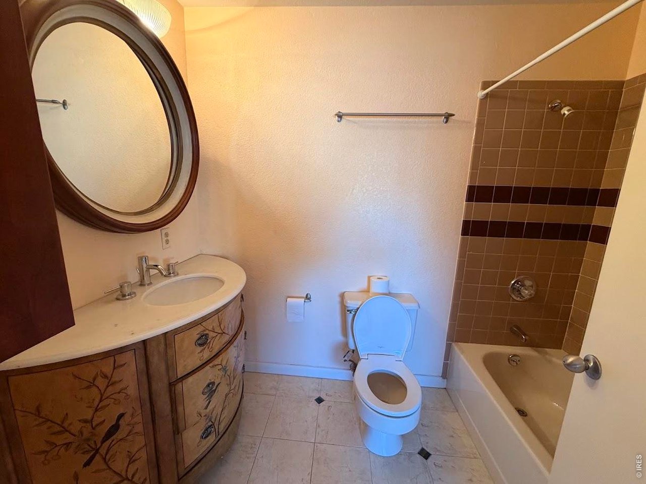 2948 Eagle Way Boulder, CO 80301 - Photo 29 of 29 a bathroom with a sink and a mirror