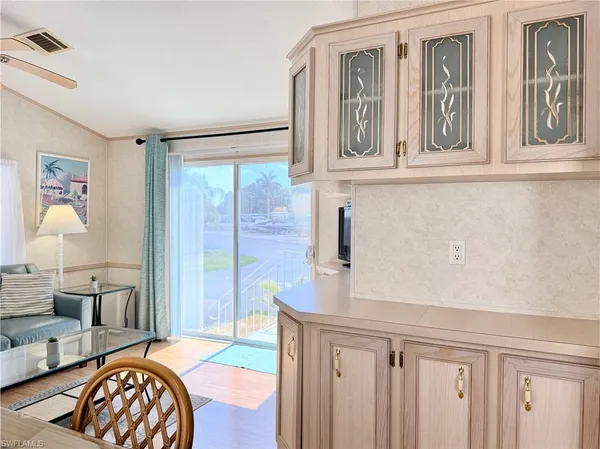 a view of a livingroom with furniture and window
