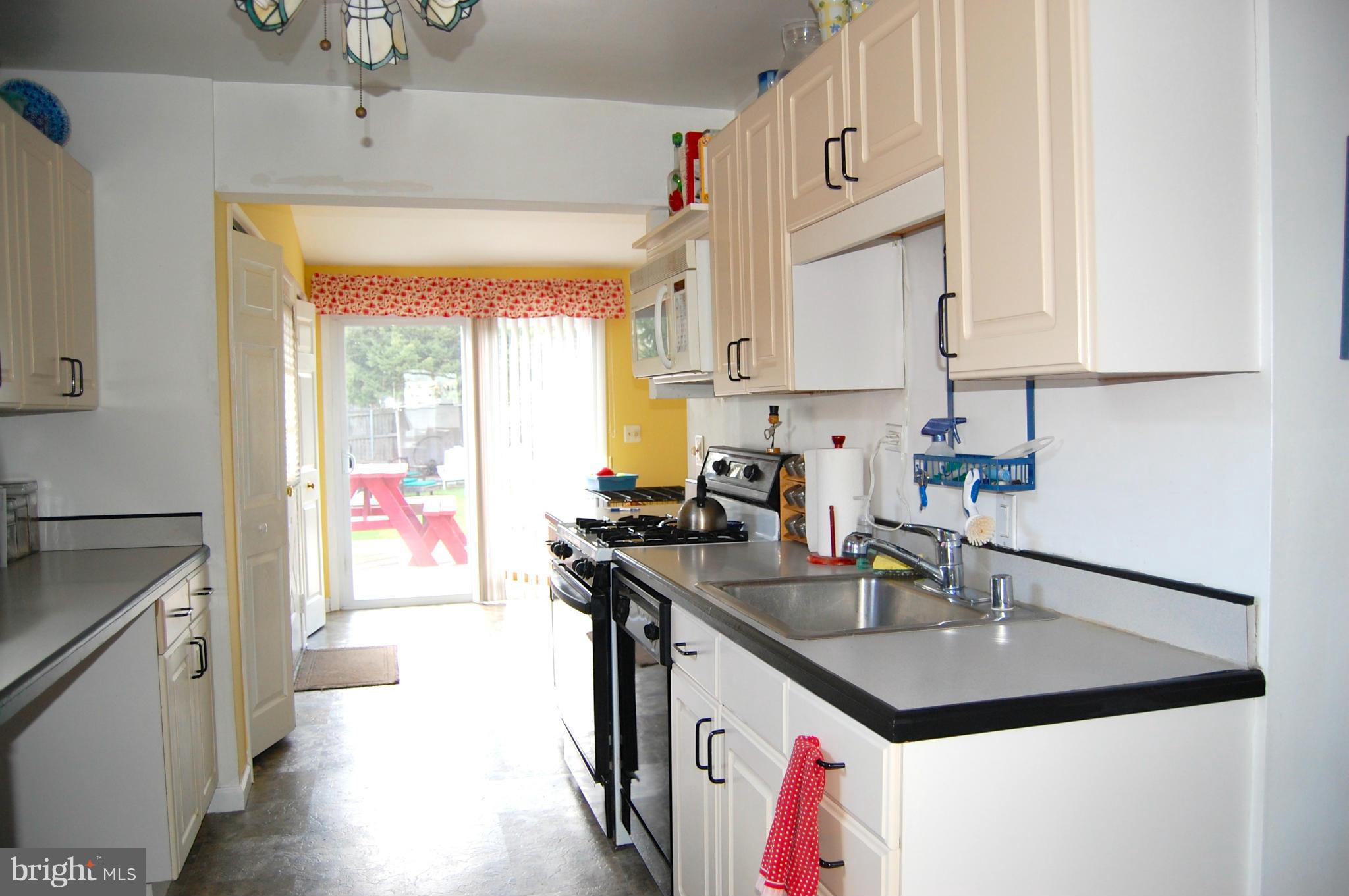 6510 Old Orchard Road Baltimore, MD 21239 - Photo 12 of 29 Kitchen Leading to Family Room and Deck!
