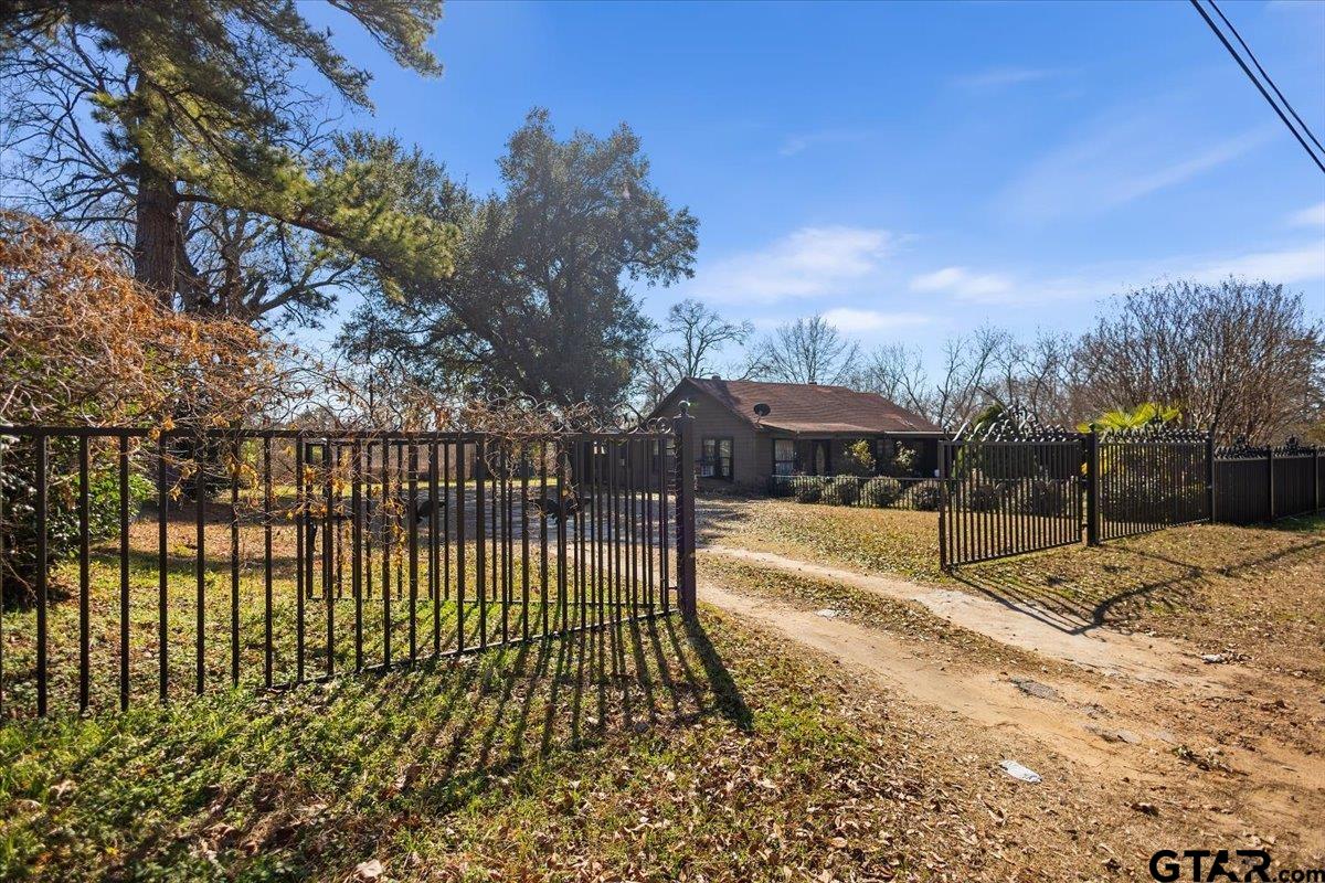 2516 Canton Street Tyler, TX 75702 - Photo 2 of 15 a view of a park with iron fence