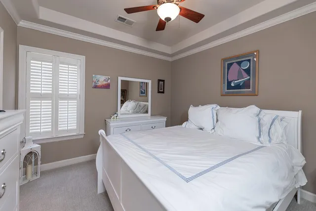 a view of a livingroom with a furniture wooden floor and window