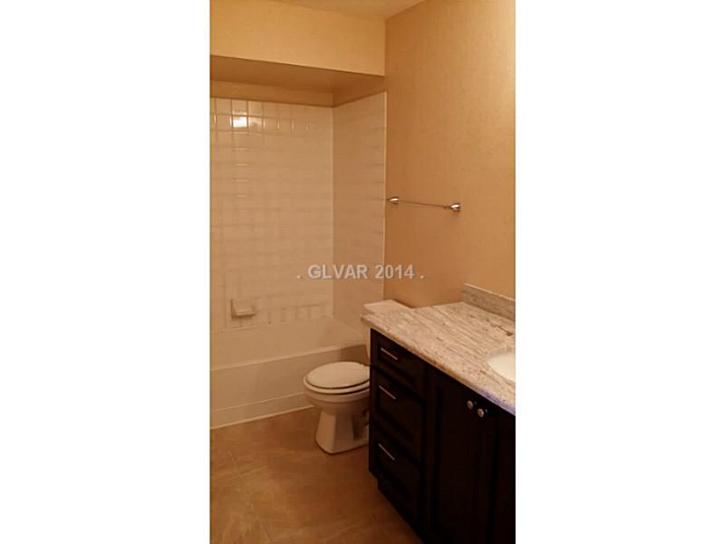 2300 East Silverado Ranch Boulevard, Unit 2190 Las Vegas, NV 89123 - Photo 7 of 8 Property Photo. Second Bathroom with New Cabinets, Granite Counters & Access to Second Bedroom