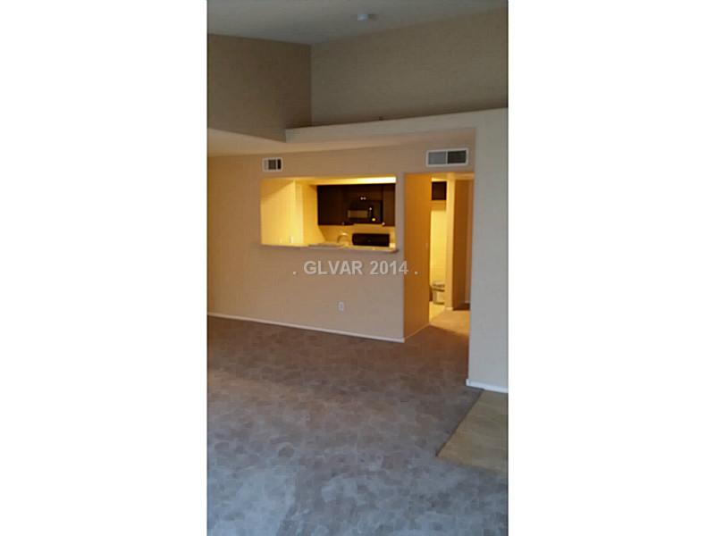 2300 East Silverado Ranch Boulevard, Unit 2190 Las Vegas, NV 89123 - Photo 8 of 8 Property Photo. View from Living Room Looking at Kitchen