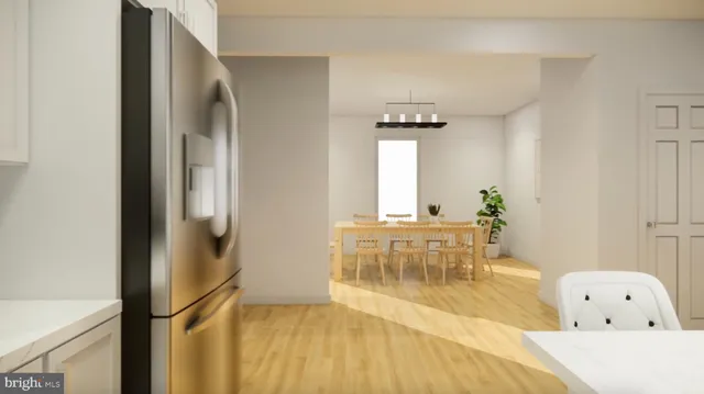 a bedroom with a bed and potted plant