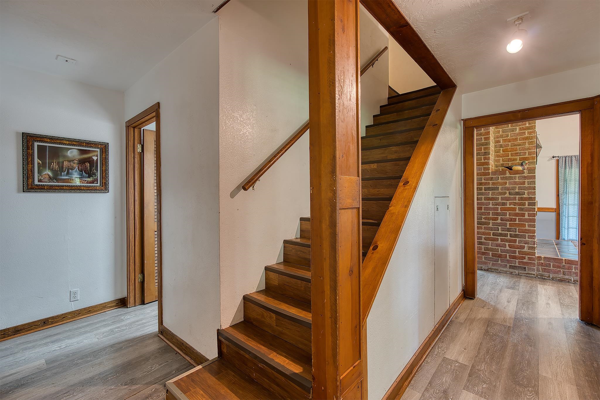 7476 Foard Road Beaumont, TX 77705 - Photo 31 of 49 a view of an entryway with wooden floor and door