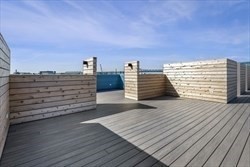 301 Border Street, Unit 406 Boston, MA 02128 - Photo 16 of 21 a view of outdoor space with wooden floor and seating space