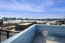 301 Border Street, Unit 406 Boston, MA 02128 - Photo 17 of 21 a view of a city from a balcony