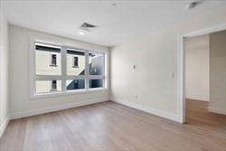 301 Border Street, Unit 406 Boston, MA 02128 - Photo 7 of 21 an empty room with a window