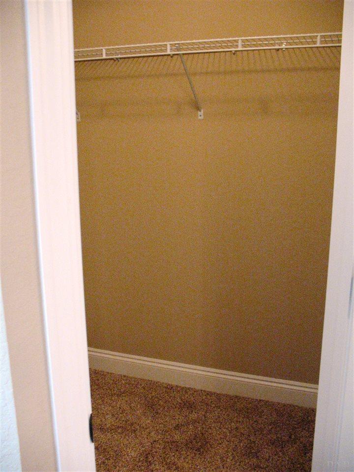 5622 Rosedown Court Milton, FL 32583 - Photo 13 of 28 Here is a 2nd master, walk-in closet.