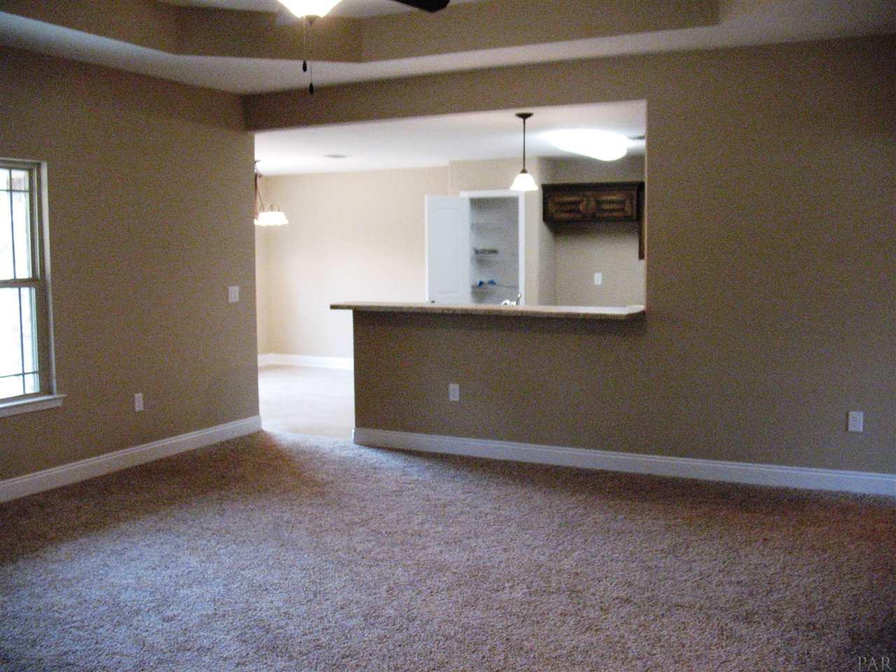 5622 Rosedown Court Milton, FL 32583 - Photo 15 of 28 Here is a view from living to kitchen and dining.