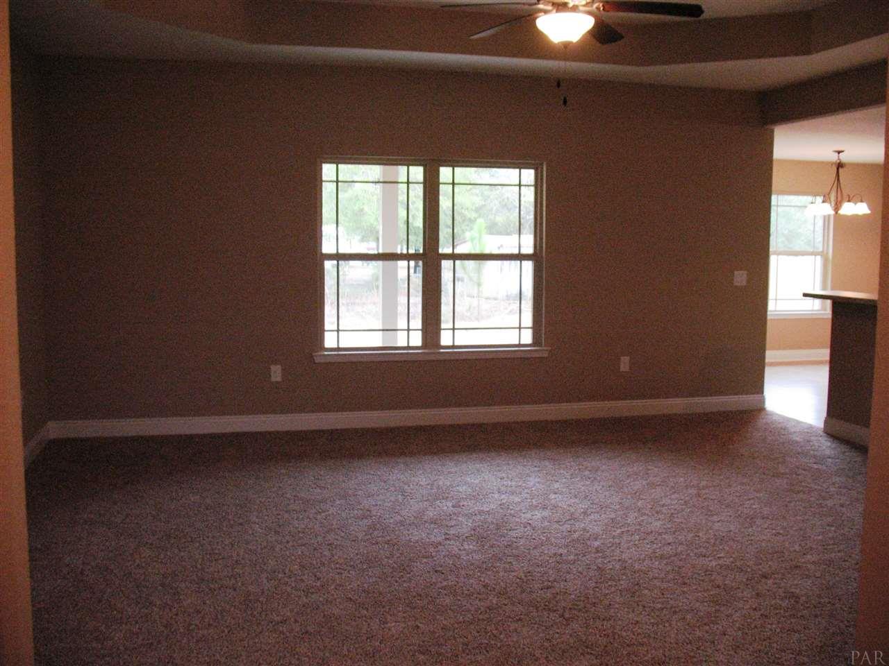 5622 Rosedown Court Milton, FL 32583 - Photo 4 of 28 Here is a view of the living room.