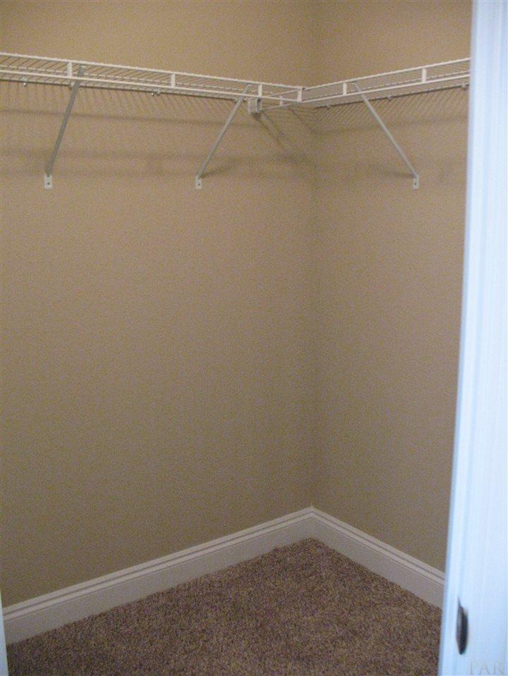 5622 Rosedown Court Milton, FL 32583 - Photo 10 of 28 A view of 1 master closet is shown here.