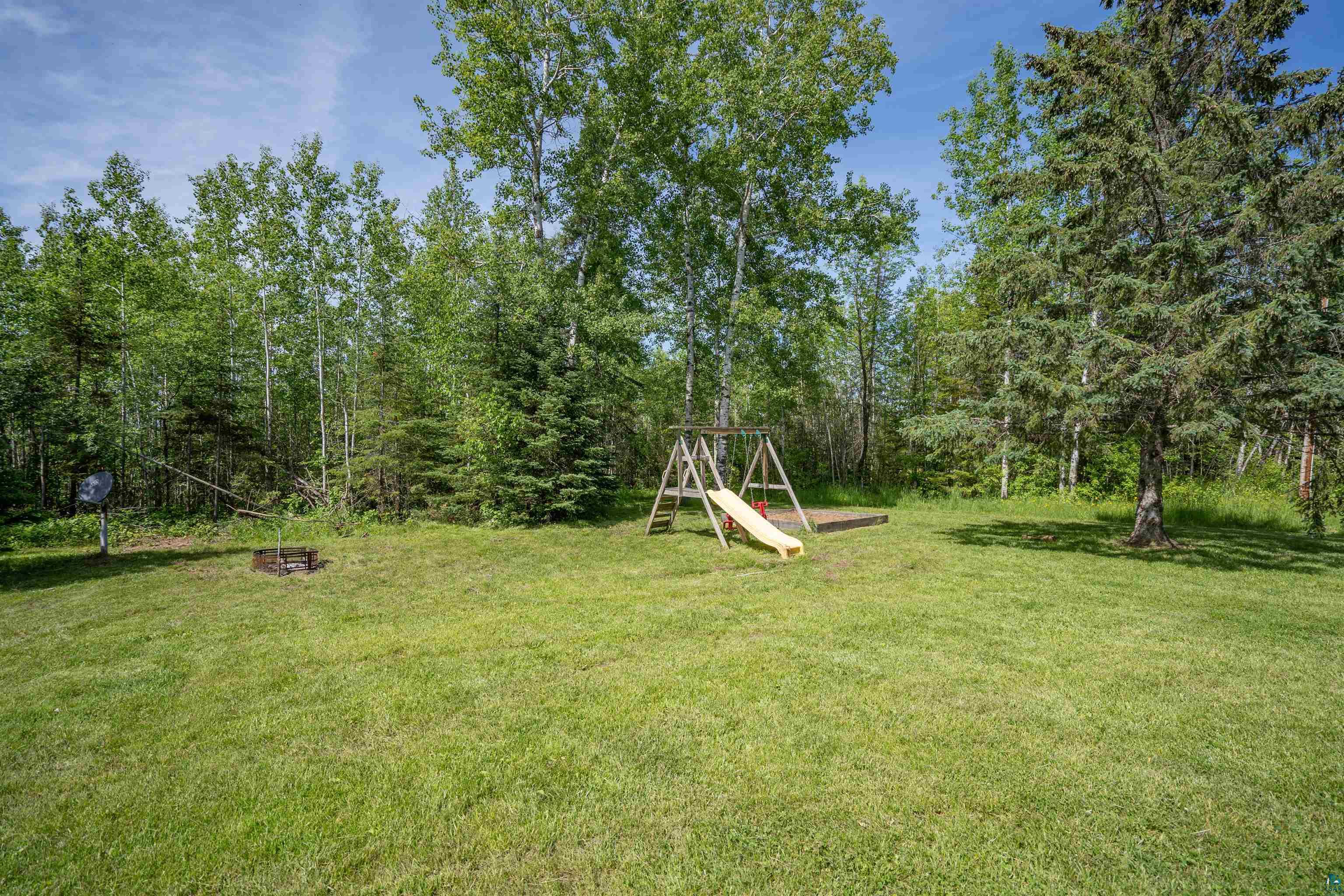 9076 East Moonshine Road South Range, WI 54874 - Photo 24 of 26 View of yard with a playground
