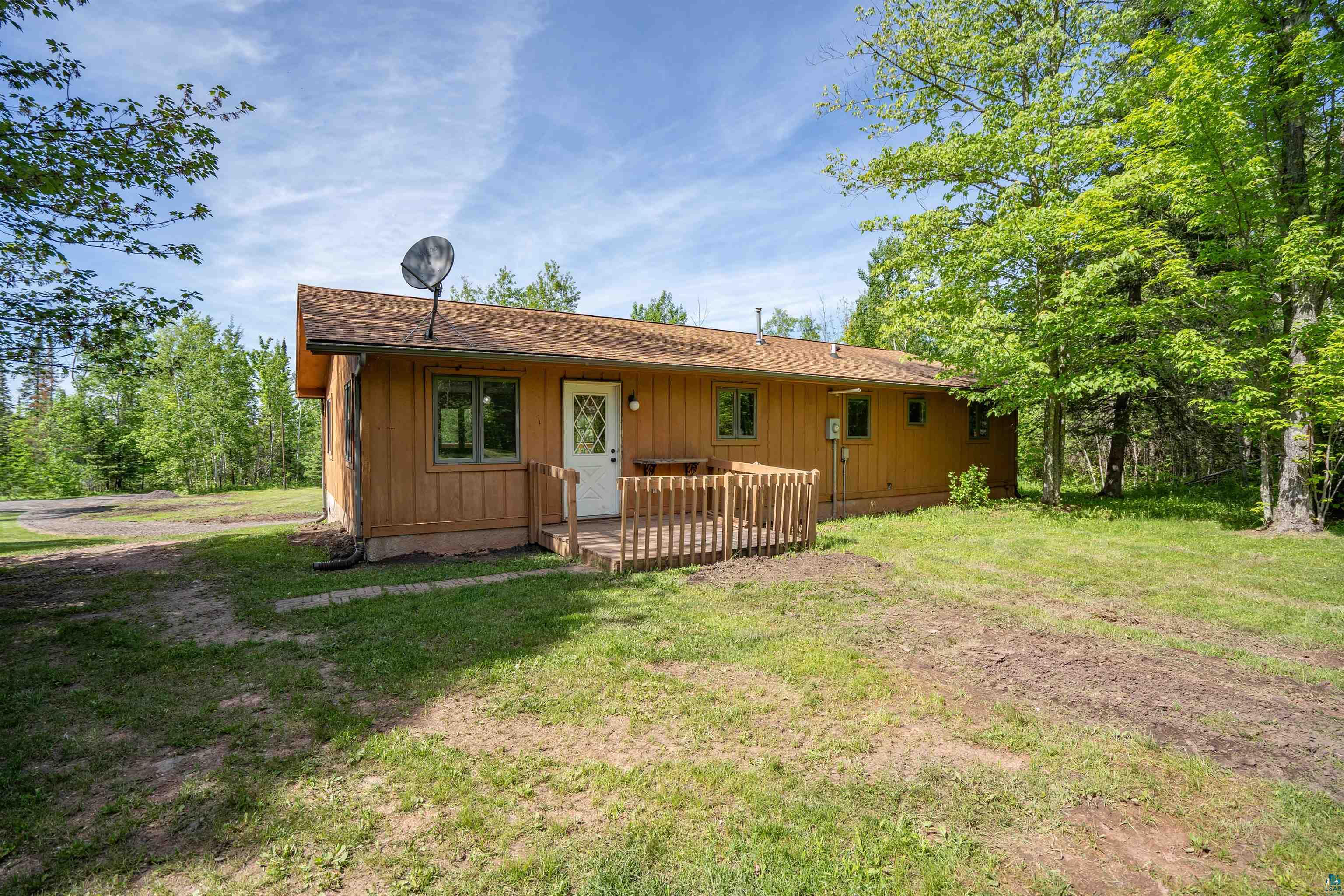 9076 East Moonshine Road South Range, WI 54874 - Photo 3 of 26 View of back of property with yard