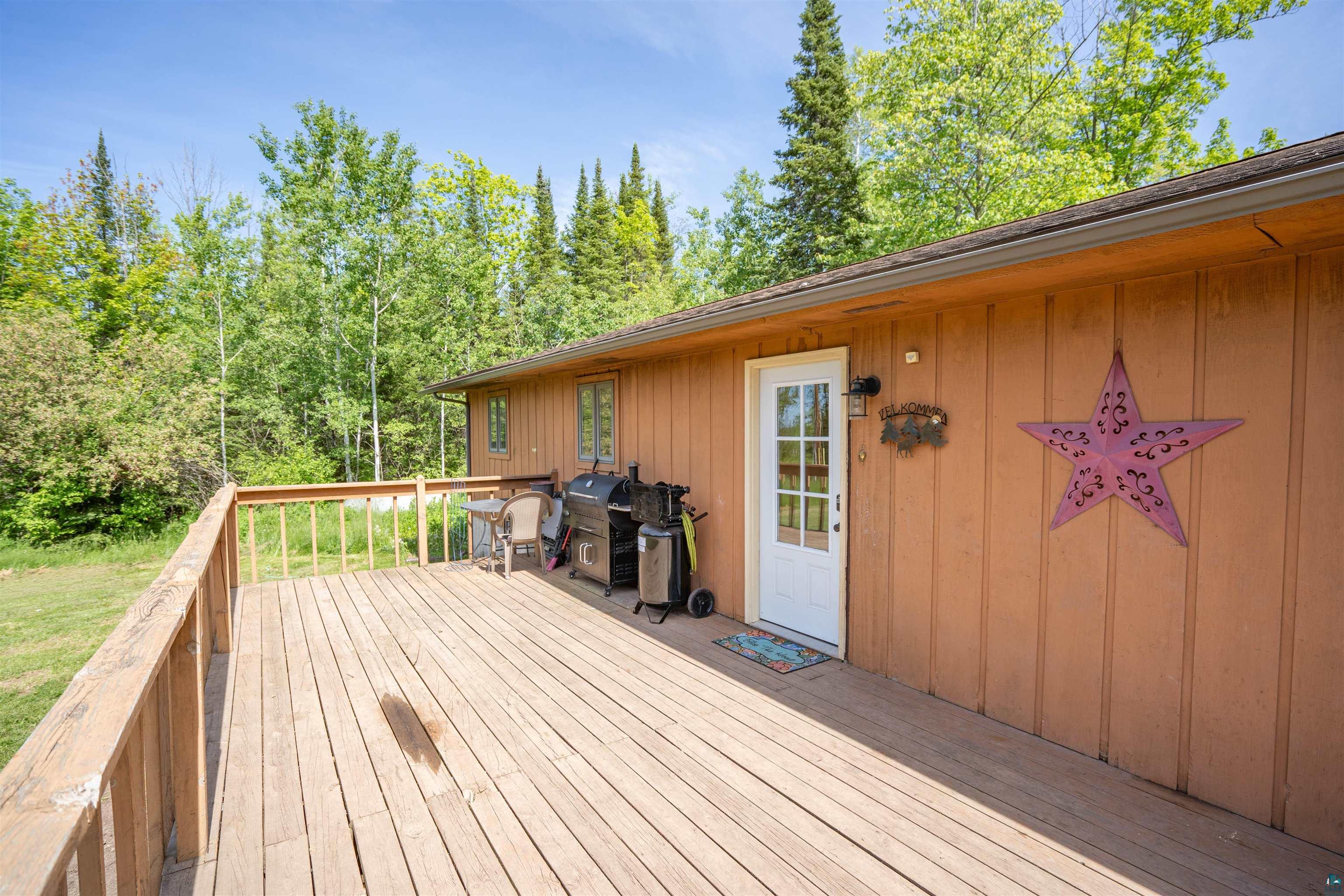 9076 East Moonshine Road South Range, WI 54874 - Photo 4 of 26 View of wooden deck