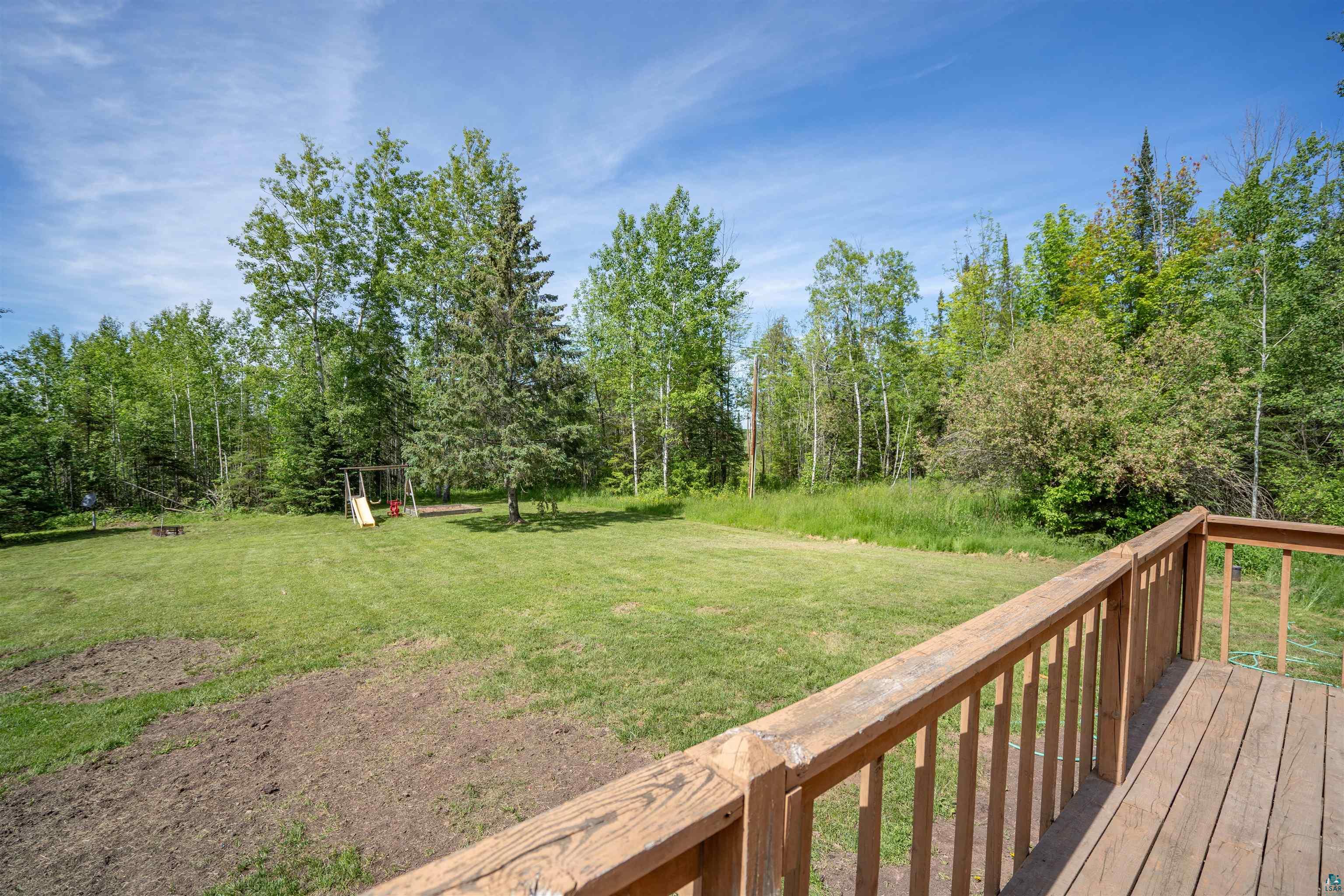 9076 East Moonshine Road South Range, WI 54874 - Photo 5 of 26 Deck with a yard