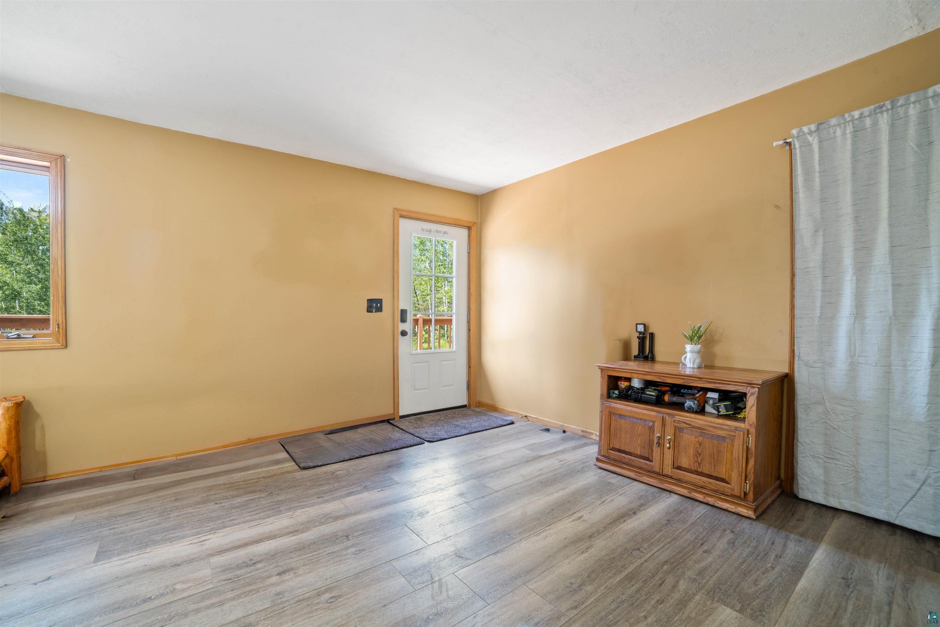 9076 East Moonshine Road South Range, WI 54874 - Photo 6 of 26 Entryway with wood-type flooring