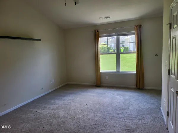 an empty room with a window