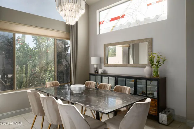 a view of a dining room with furniture window and outside view