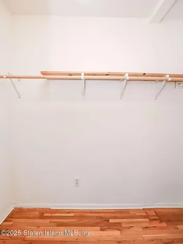 a view of a room with racks on the wall