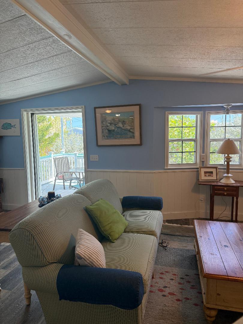 27973 Snapper Lane Summerland Key, FL 33042 - Photo 10 of 25 a living room with furniture and a window