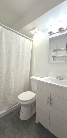 a view of a city with an ocean view