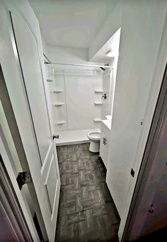 a bathroom with a sink and a toilet