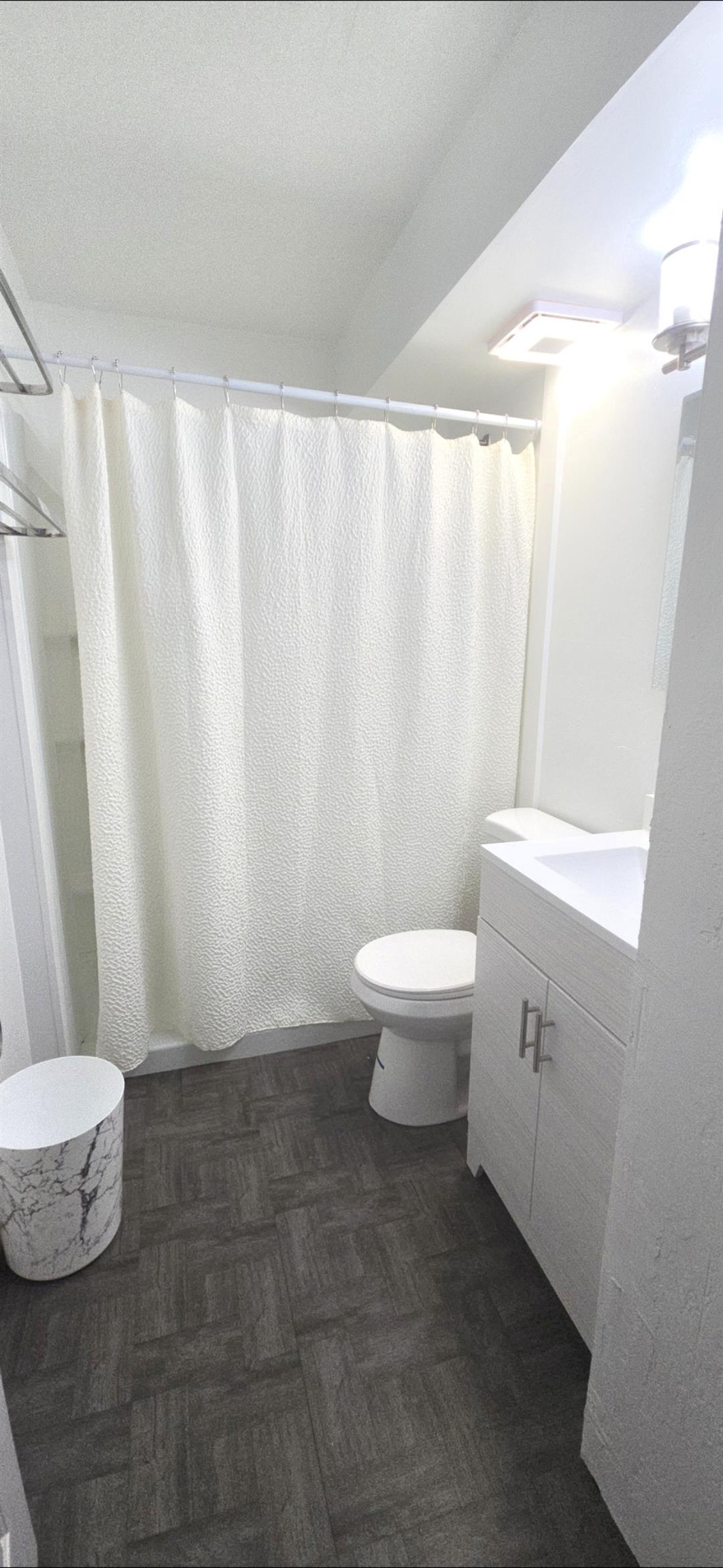 3676 Lower Honoapiilani Road, Unit F102 Lahaina, HI 96761 - Photo 10 of 12 a bathroom with a sink and a toilet