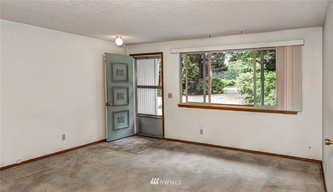 6742 North Enterprise Road Ferndale, WA 98248 - Photo 13 of 25 a view of empty room with window and refrigerator