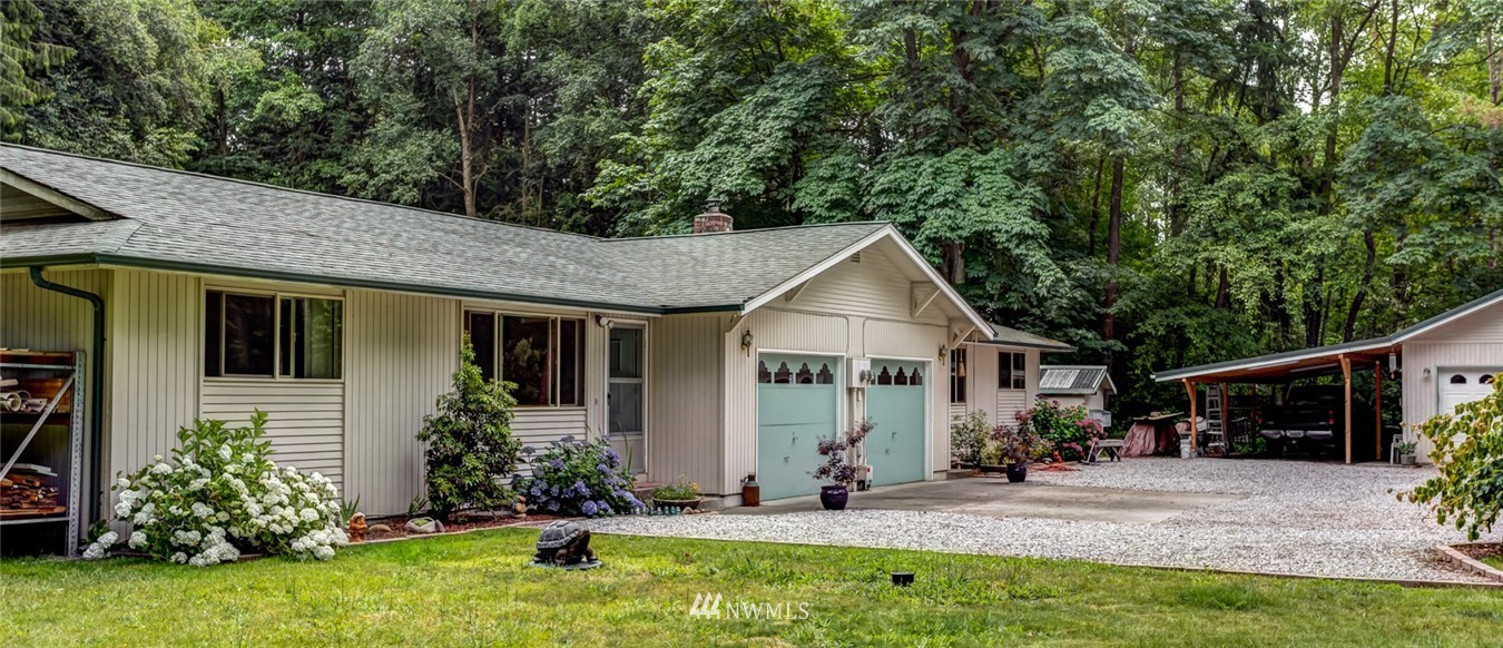 6742 North Enterprise Road Ferndale, WA 98248 - Photo 24 of 25 a view of a house with backyard and garden