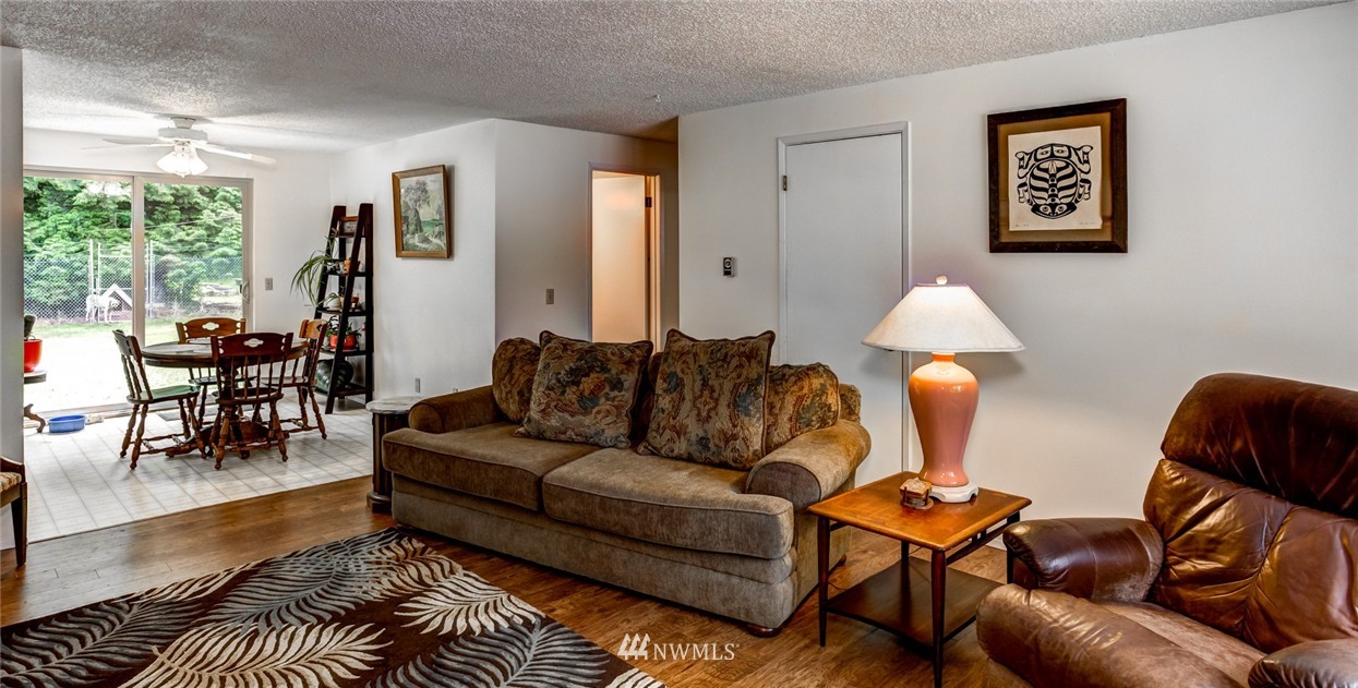 6742 North Enterprise Road Ferndale, WA 98248 - Photo 6 of 25 a living room with furniture and a large window