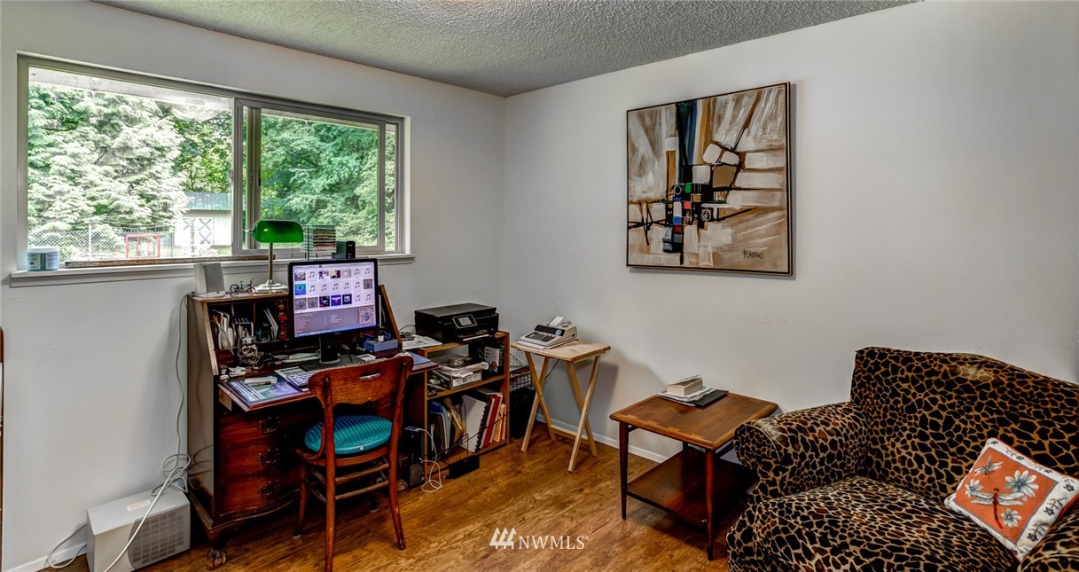 6742 North Enterprise Road Ferndale, WA 98248 - Photo 7 of 25 a livingroom with workspace and a window