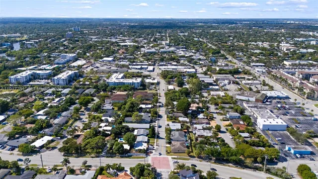 an aerial view of a city with lots of residential buildings