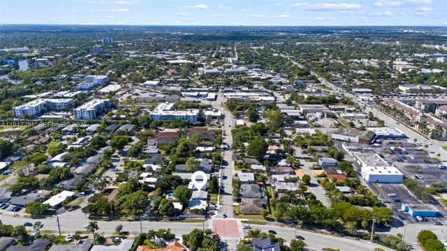 an aerial view of a city with lots of residential buildings