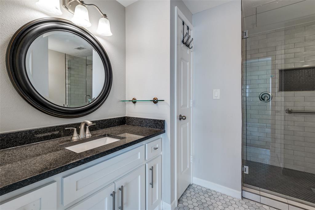 2601 Preston Road, Unit 3103 Plano, TX 75093 - Photo 22 of 30 a bathroom with a sink and a mirror