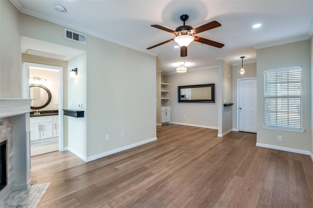 2601 Preston Road, Unit 3103 Plano, TX 75093 - Photo 9 of 30 wooden floor in an empty room with a window