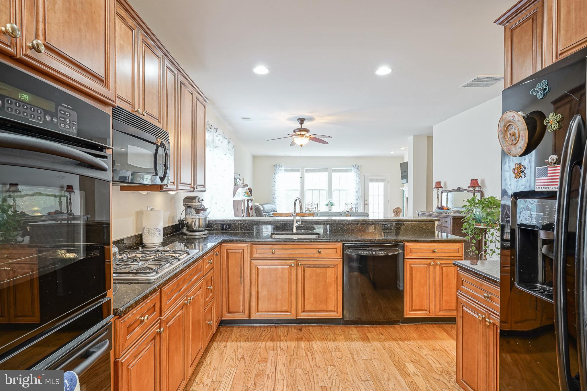213 Limerick Street Absecon, NJ 08205 - Photo 7 of 39 Warm wood tones in a modern kitchen.