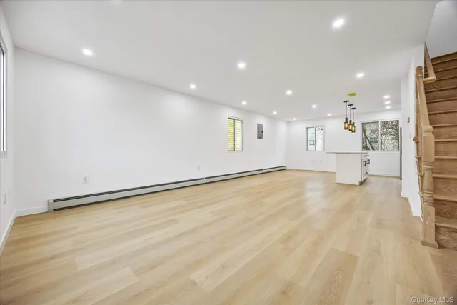 a view of an empty room with a sink