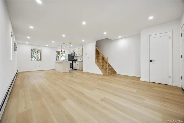 a view of a kitchen with a sink