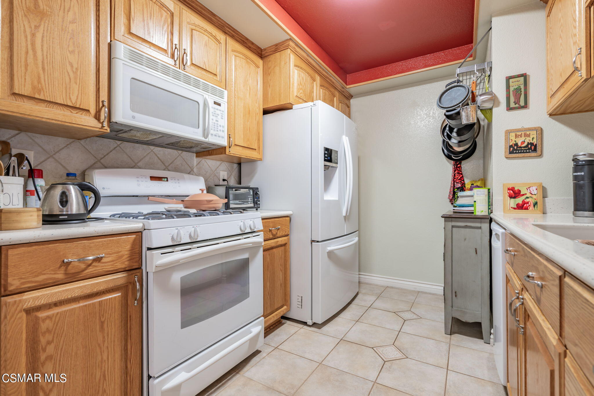 2044 Covington Avenue Simi Valley, CA 93065 - Photo 13 of 42 a kitchen with stainless steel appliances granite countertop a refrigerator and a stove