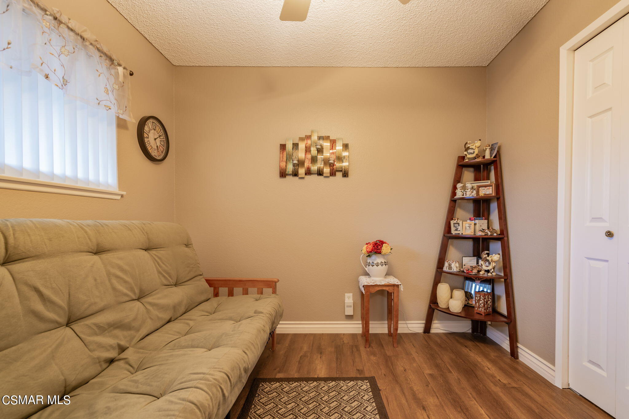 2044 Covington Avenue Simi Valley, CA 93065 - Photo 18 of 42 a bedroom with a bed and a window