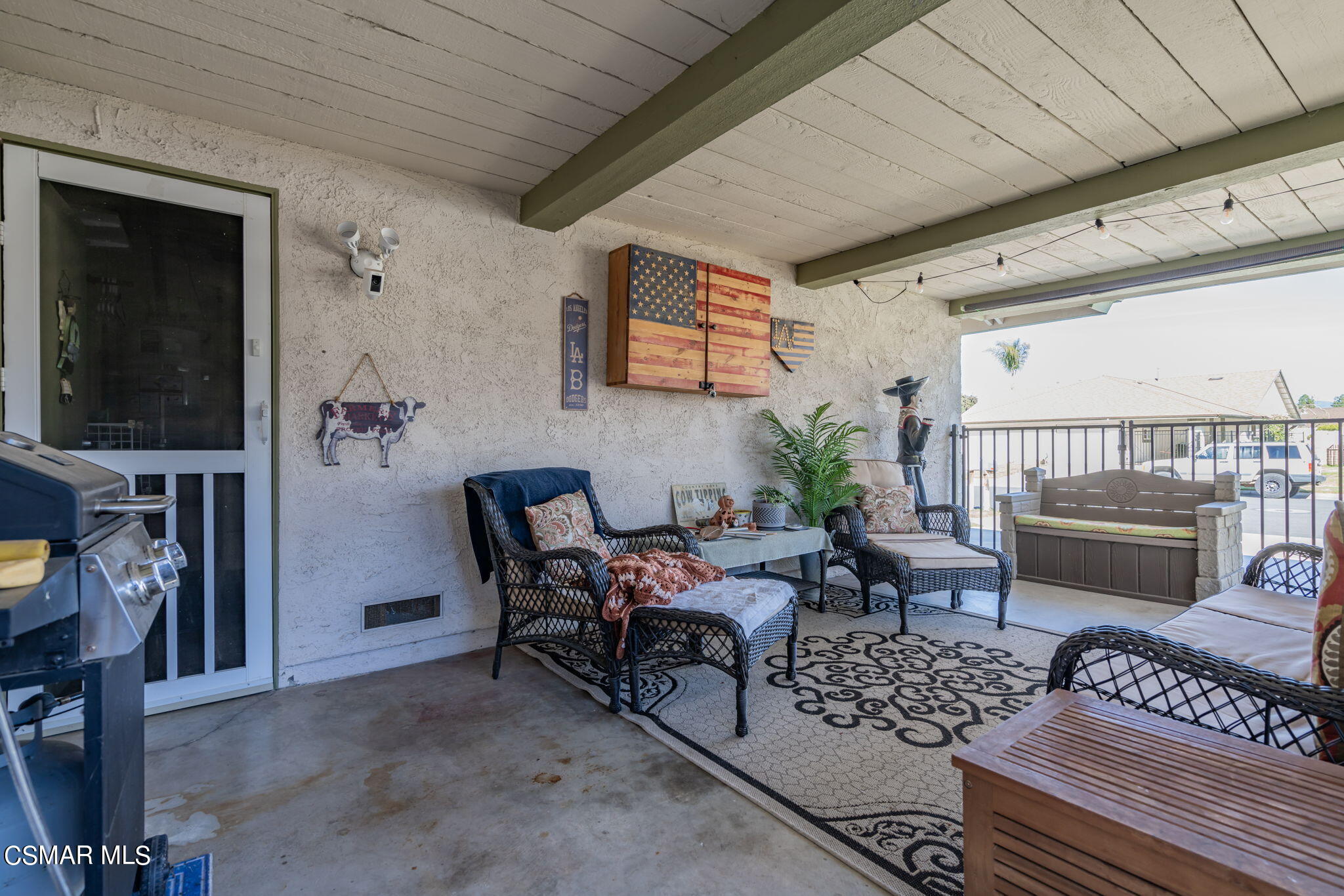 2044 Covington Avenue Simi Valley, CA 93065 - Photo 32 of 42 a living room with furniture a flat screen tv and rug